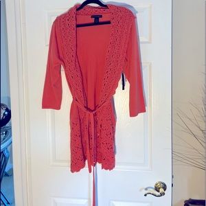 Grace Elements orange sweater from the urban island collection.